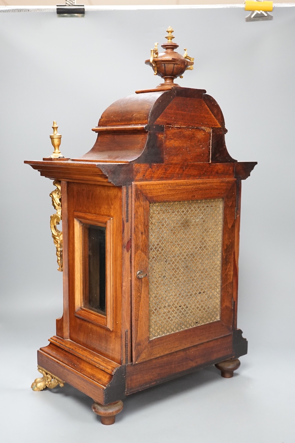 A reproduction gilt metal mounted bracket clock, 55cm